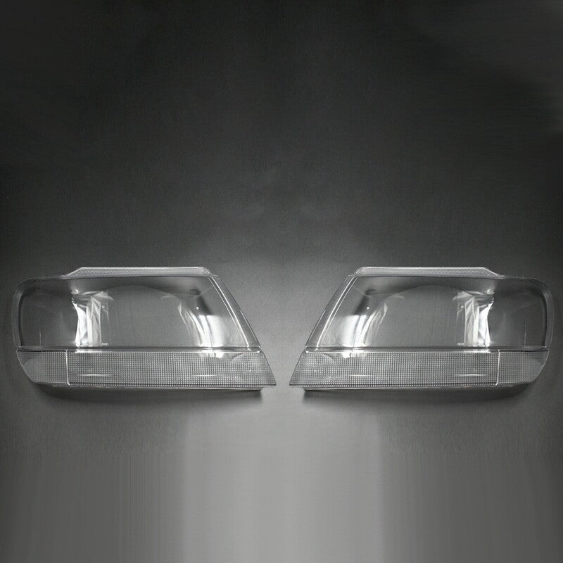 A pair of headlight lens covers for Jeep Grand Cherokee 1999-2004