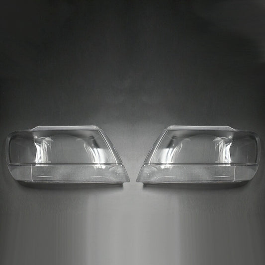 A pair of headlight lens covers for Jeep Grand Cherokee 1999-2004