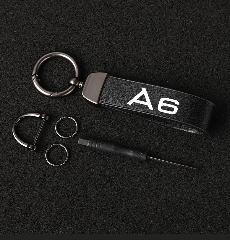 Suitable for Audi for A6 car keychain/key ring, black leather horseshoe buckle gift.