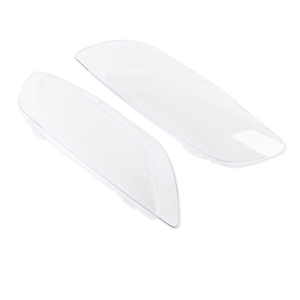 Left and right front headlight protective covers and lens housings for Audi Q7 models from 2006 to 2015.