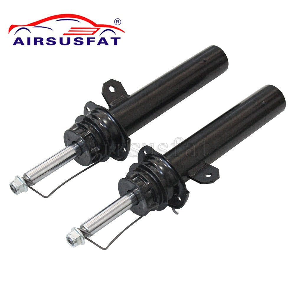A pair of front left shock absorber struts with EDC for Mini Cooper 2014-2022.