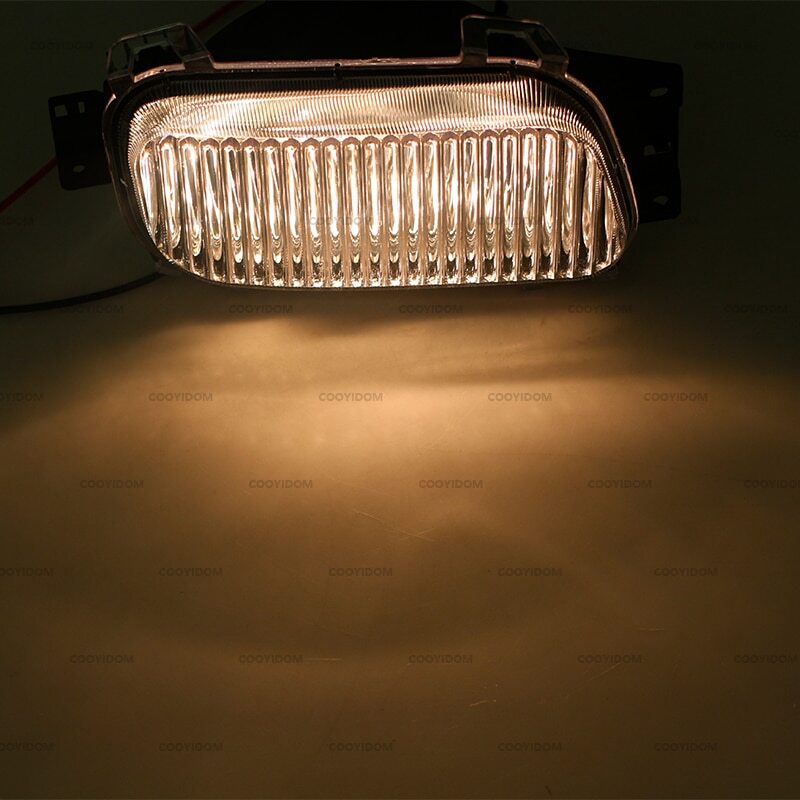 A pair of front bumper fog lights with bulbs for Mitsubishi Canter FUSO FE 7/8 2005-11