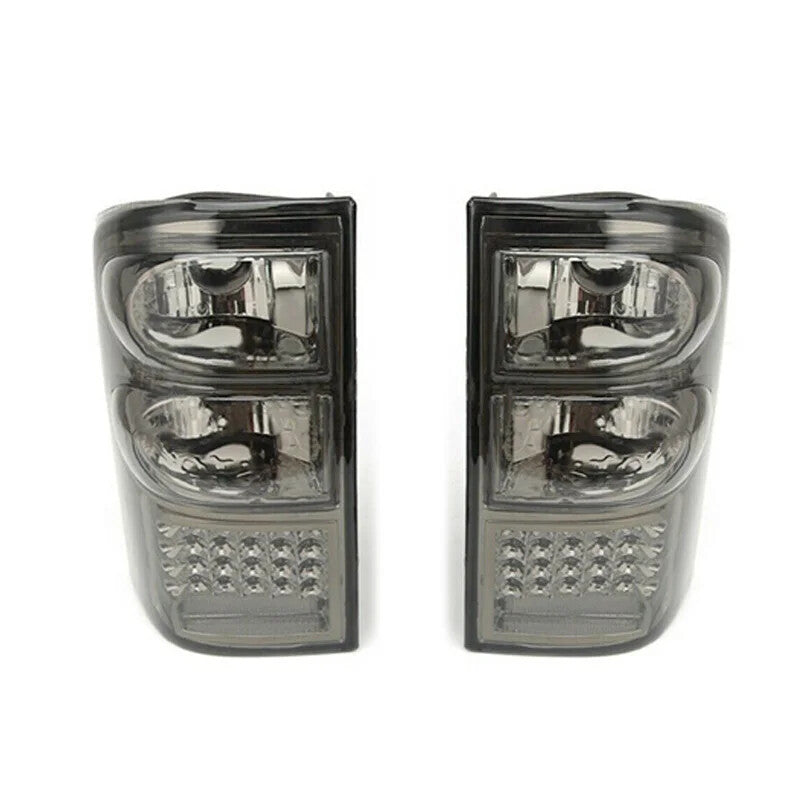Smoked LED taillights (LH+RH) suitable for Nissan Patrol GU Y61 (1997-2004).