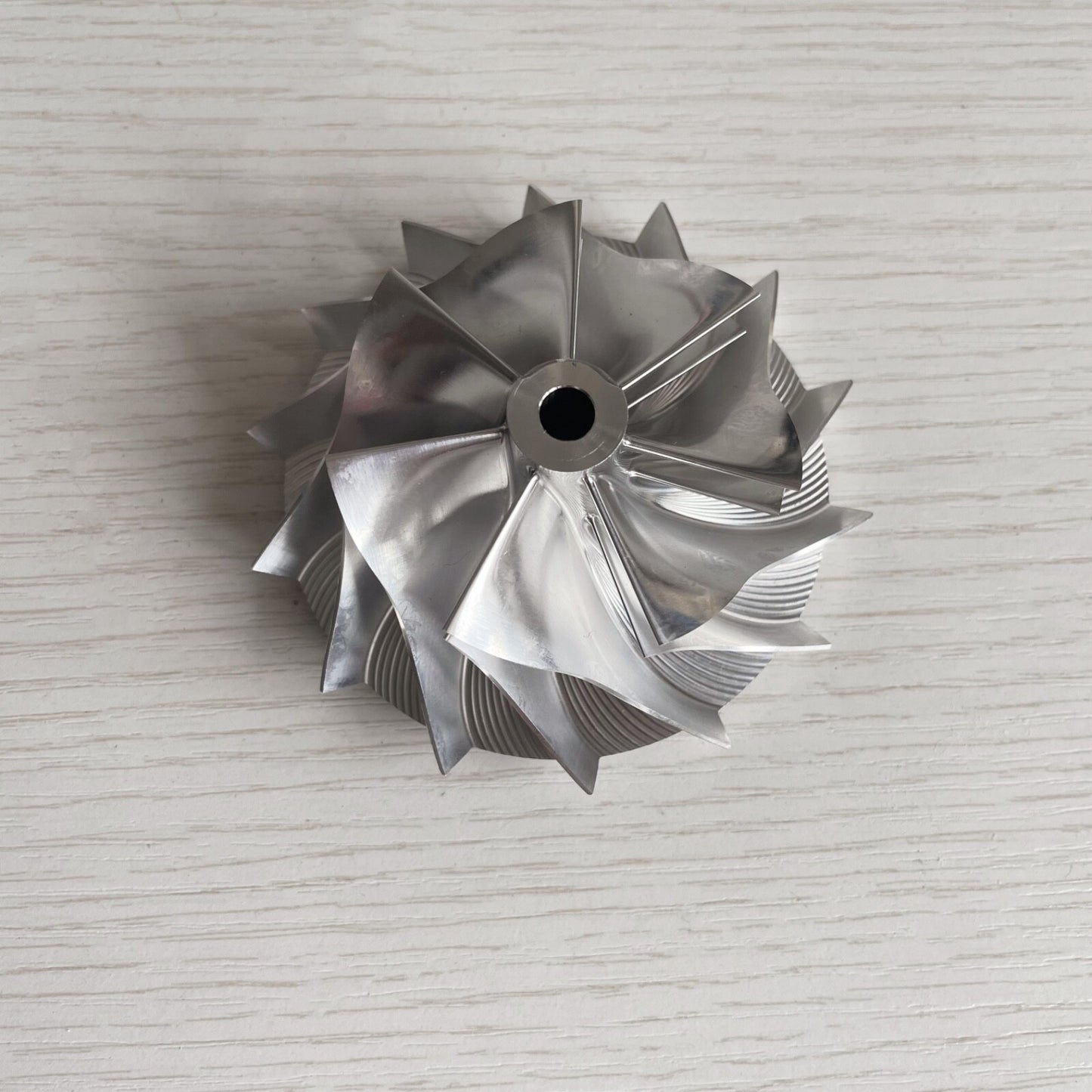 TD05H Forward-curving 57.69/78.00 mm 7+7 blade high-performance billet compressor wheel