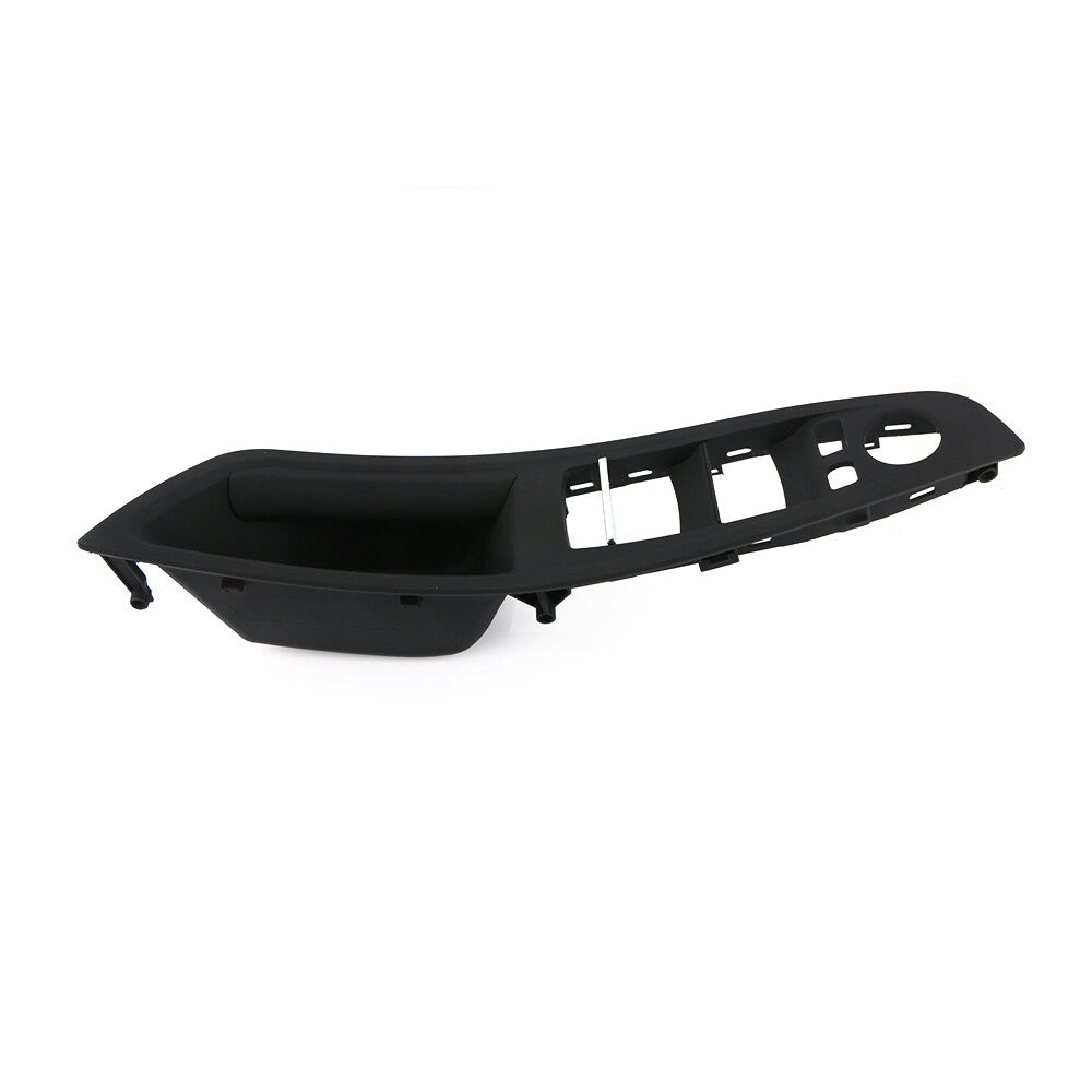 Black trim around the front right door window control panel for BMW F10