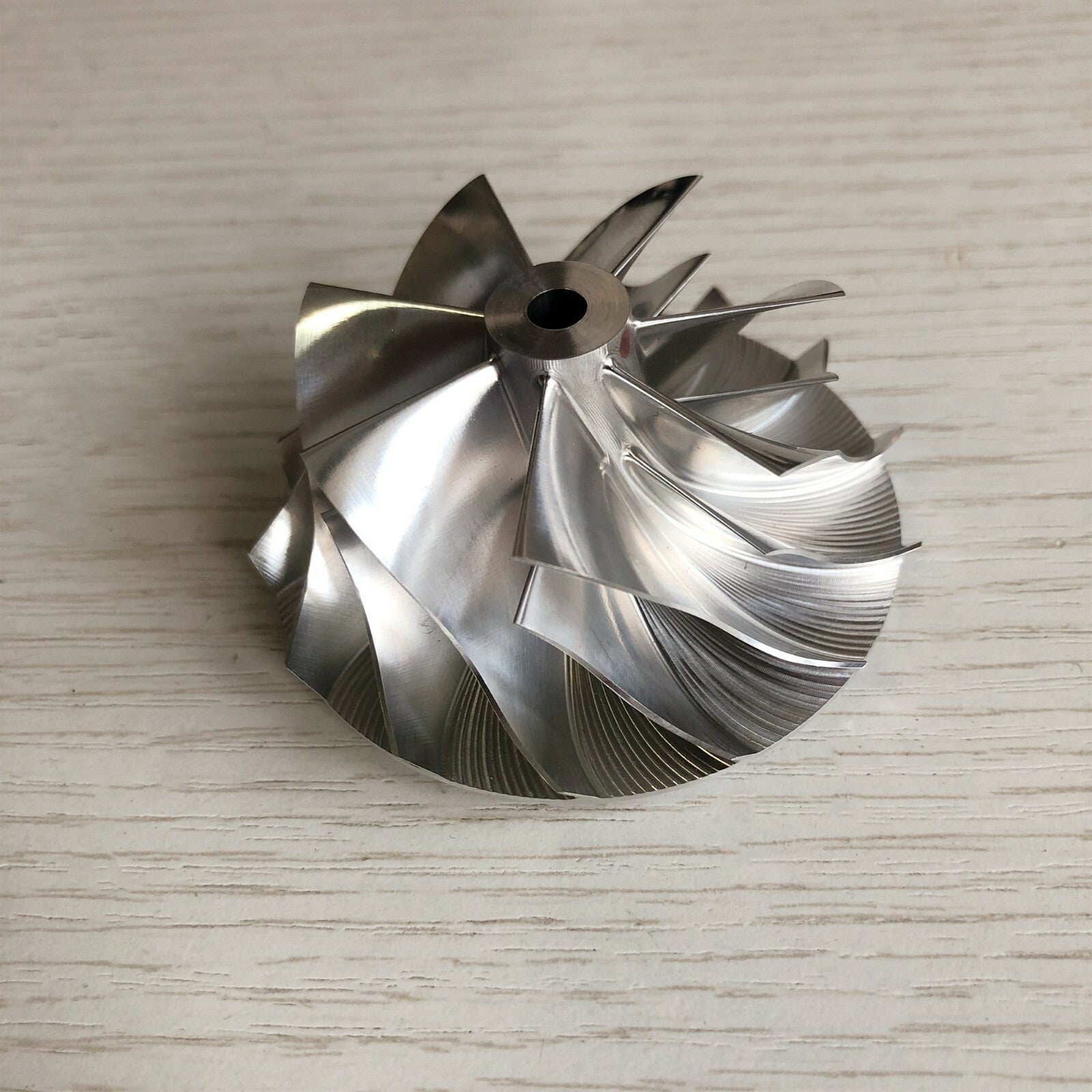 GT15-25 49.15/63.00 mm 7+7 Blade High-Performance Turbine Billet Compressor Wheel